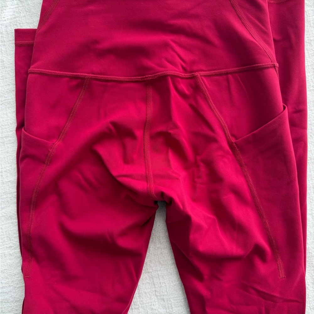 Lululemon Athletica Women's pink Leggings - wunder train with pockets 25 inch